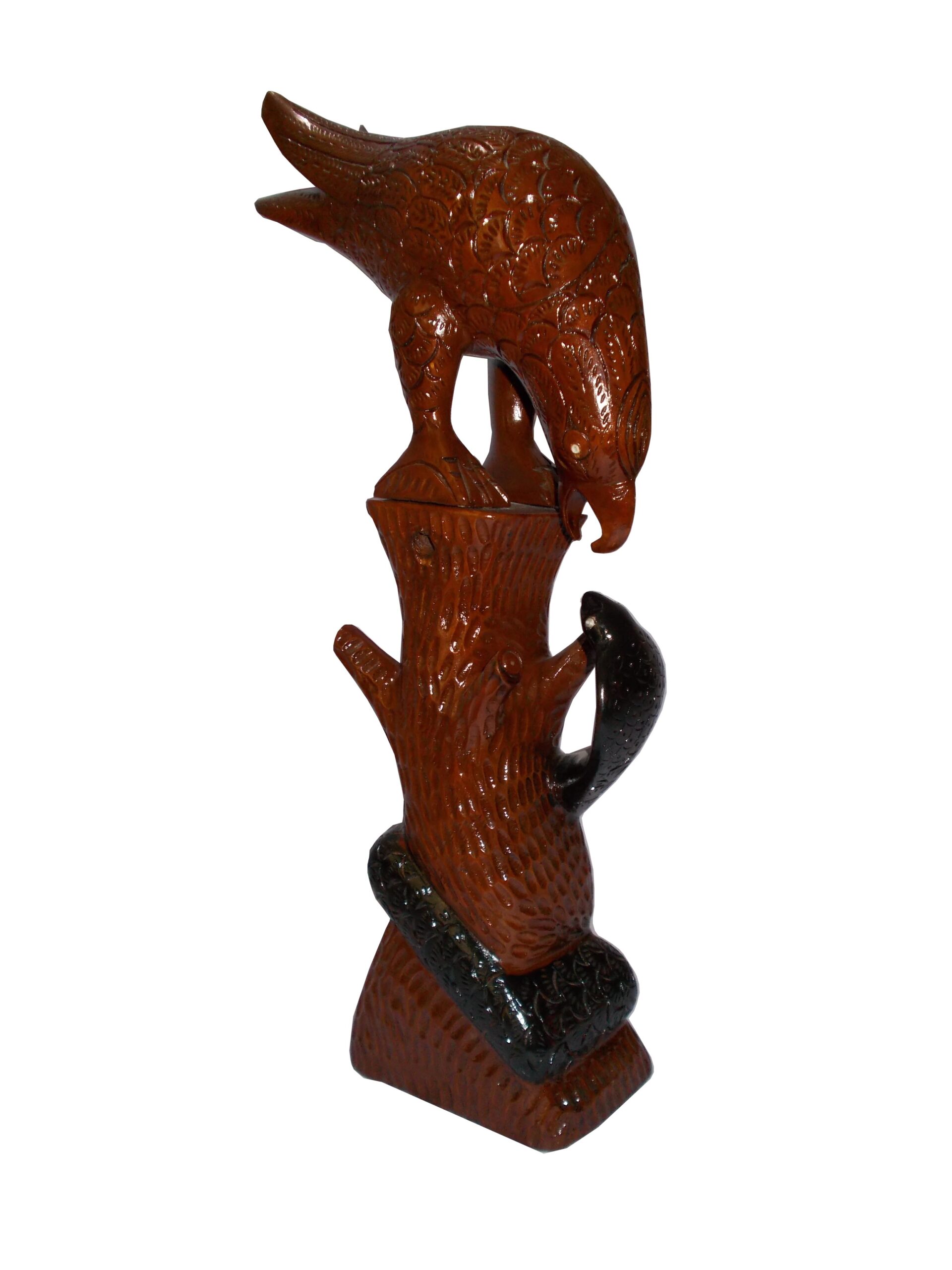 wooden eagle holding a serpent