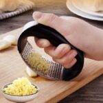 Steel garlic crusher